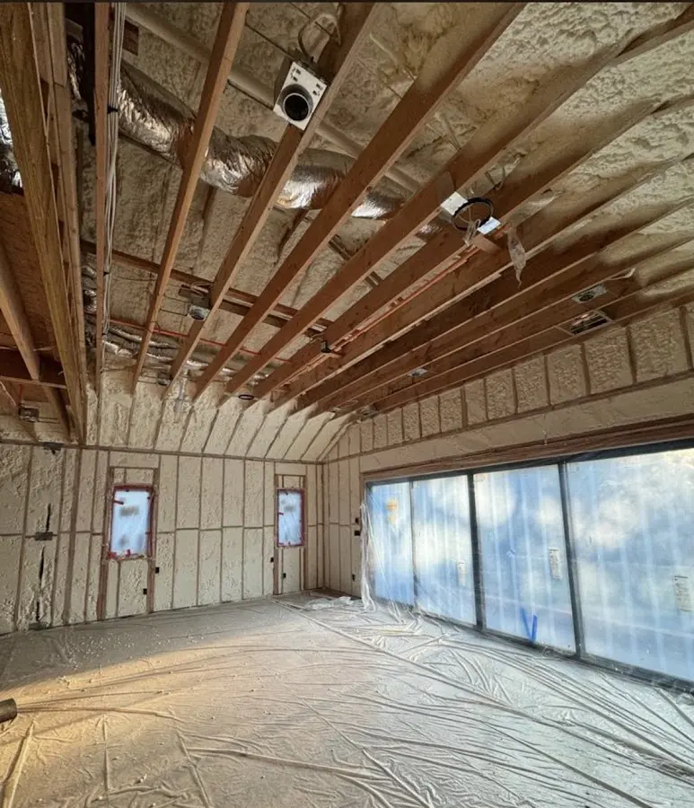 Interior walls and ceiling insulated with spray foam during new construction in Ballston